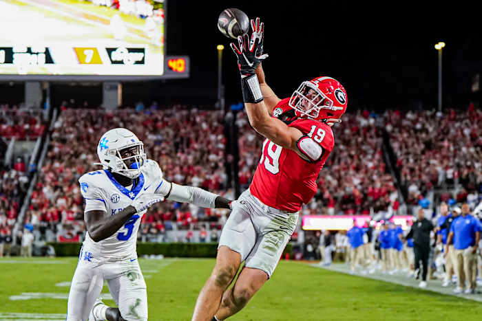 Oct 7, 2023; Athens, Georgia, USA; Georgia Bulldogs tight end Brock Bowers (19) can t hold a pass behind Kentucky Wildcats defensive back Alex Afari Jr. (3) at Sanford Stadium. Mandatory Credit: Dale Zanine-USA TODAY Sports